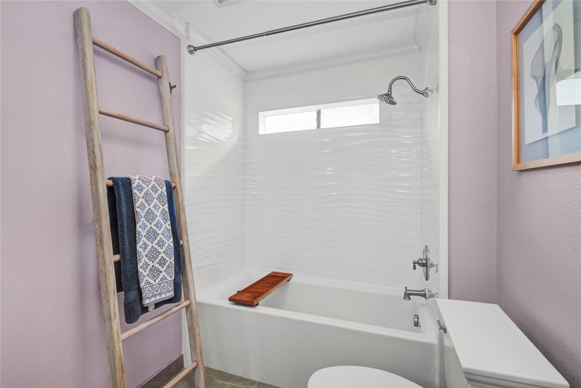 8412 Hidden Trail Lane Spring, TX 77379 - Photo 30 of 43 The well-appointed Jack and Jill bathroom features a full tub and shower combination with convenient access between adjoining bedrooms.