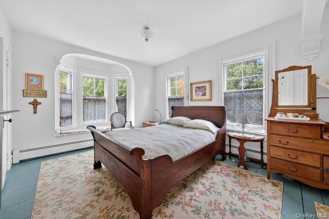 69 Smith Hill Road Airmont, NY 10952 - Photo 18 of 35 a bedroom with a bed and a window