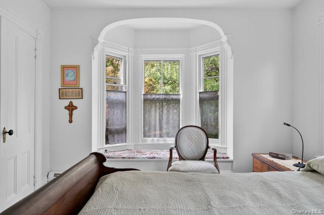 69 Smith Hill Road Airmont, NY 10952 - Photo 19 of 35 a bedroom with bed and a large window