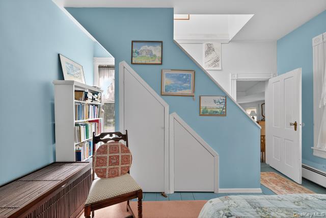 69 Smith Hill Road Airmont, NY 10952 - Photo 21 of 35 a view of a livingroom with furniture and staircase