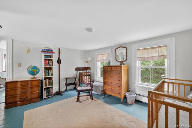 69 Smith Hill Road Airmont, NY 10952 - Photo 22 of 35 a bedroom with furniture and a window