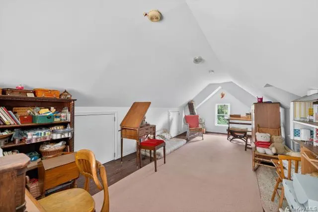 a room with furniture and gym equipment