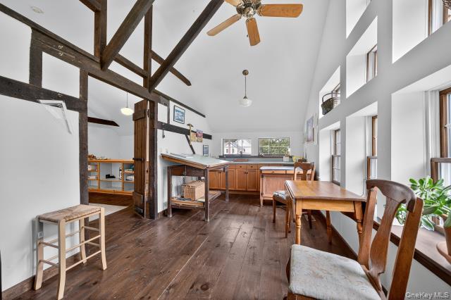 69 Smith Hill Road Airmont, NY 10952 - Photo 32 of 35 a living room with furniture and a dining table