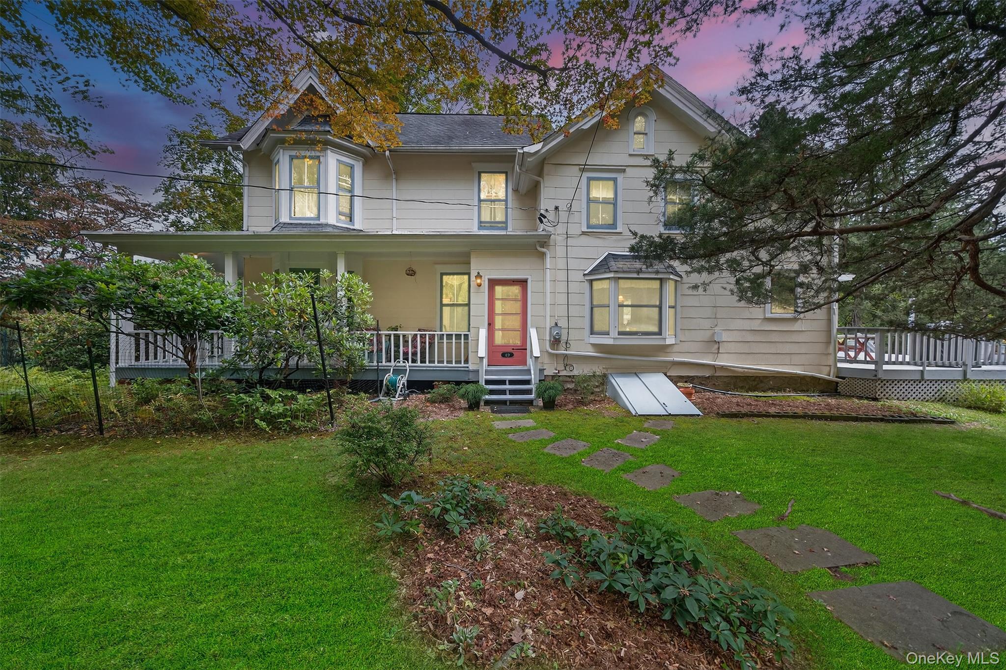 69 Smith Hill Road Airmont, NY 10952 - Photo 35 of 35 a view of a house with a yard porch and sitting area