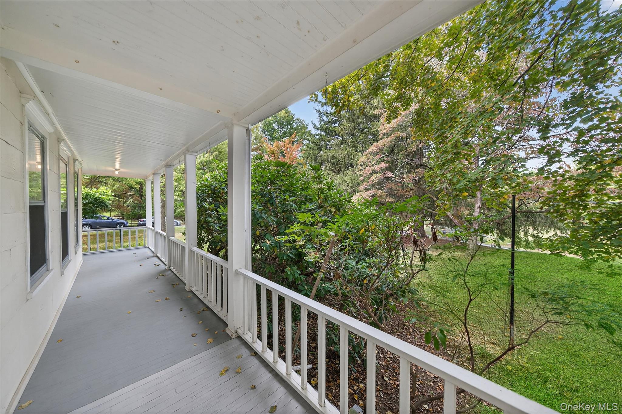 69 Smith Hill Road Airmont, NY 10952 - Photo 5 of 35 a view of a porch with a yard