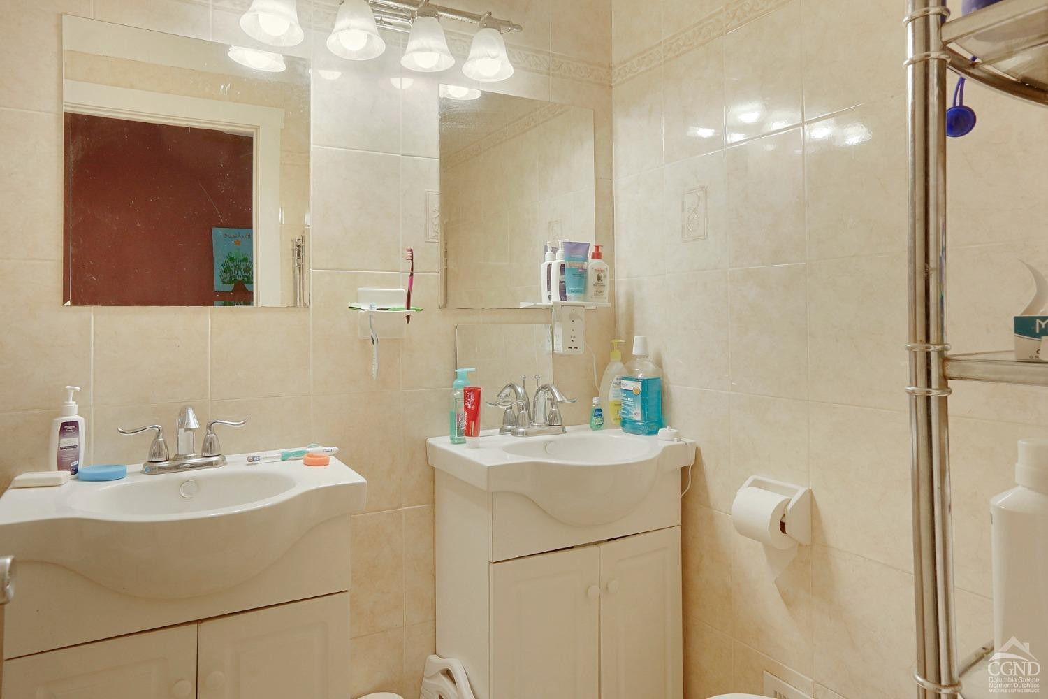 197 R McLaren Road South Cairo, NY 12482 - Photo 13 of 35 a bathroom with a sink and a mirror