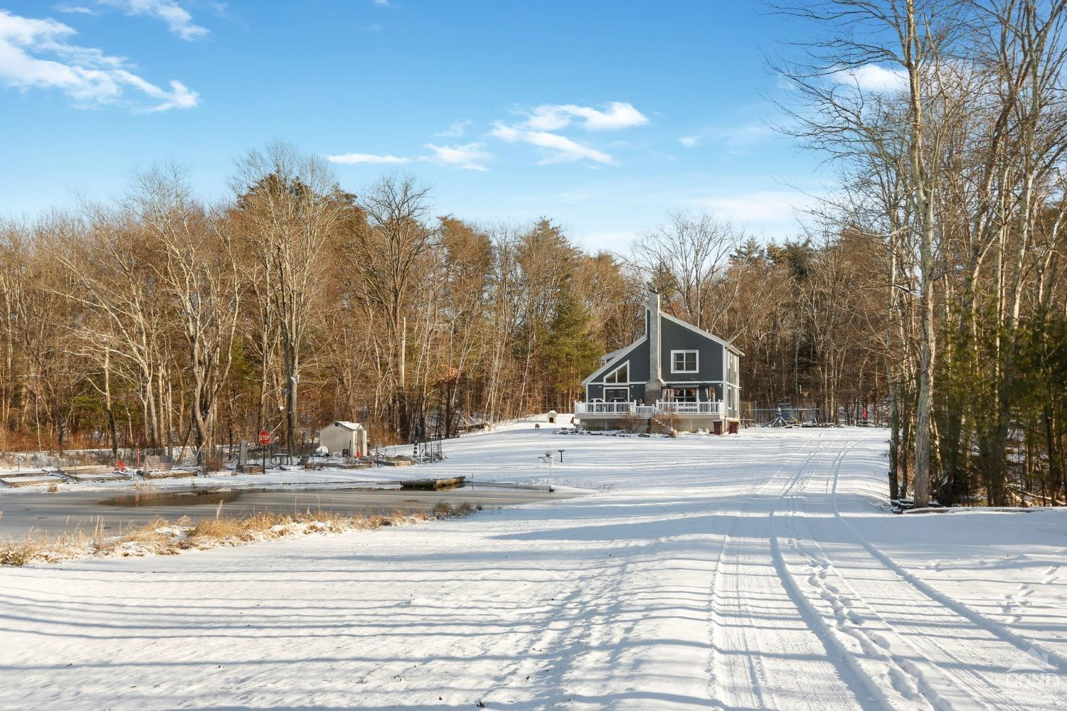 197 R McLaren Road South Cairo, NY 12482 - Photo 27 of 35 a view of white house with a big yard and large trees