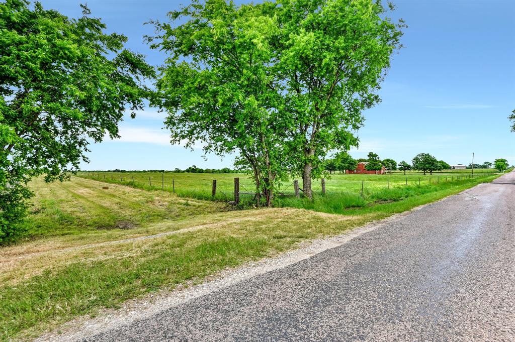 Tbd Airport Road Tioga, TX 76271 - Photo 27 of 28 a view of a street with a yard and large trees