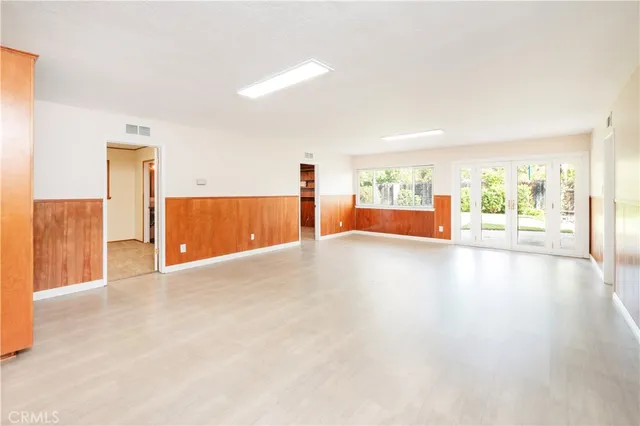 a view of a kitchen with a refrigerator