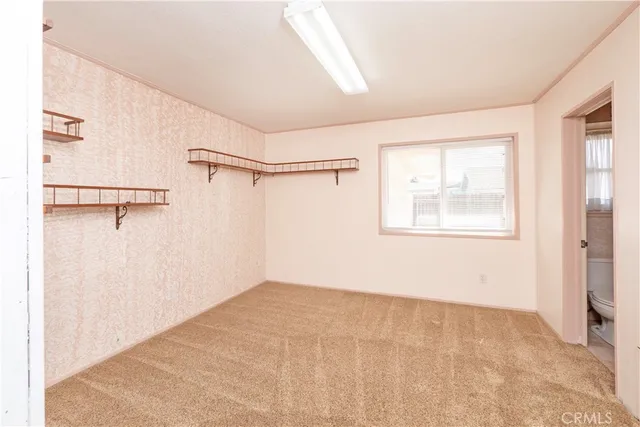 a view of a room with racks on the wall