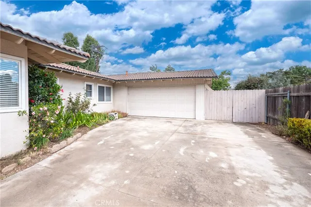 a view of a building with a yard