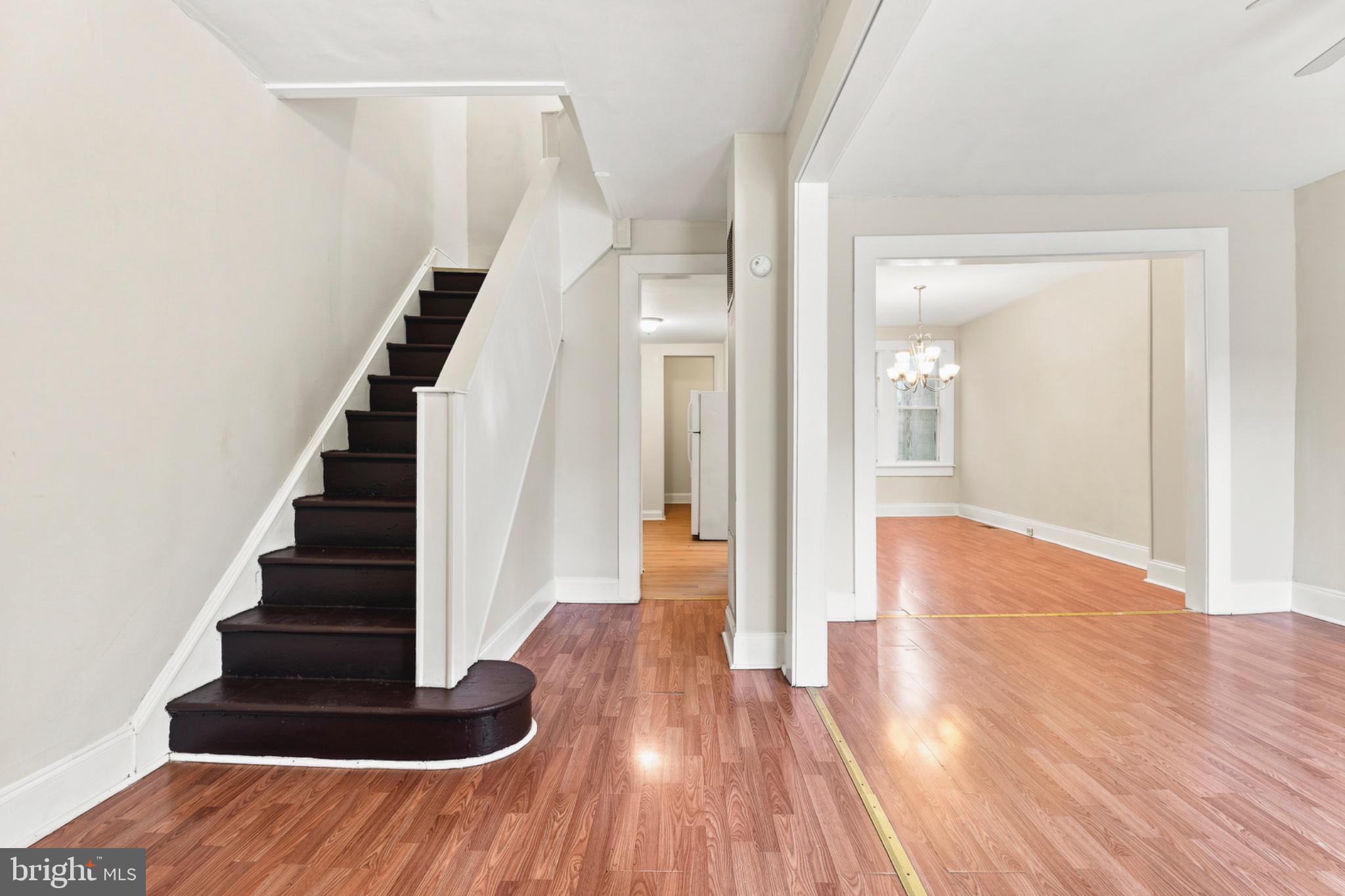 730 Linnard Street Baltimore, MD 21229 - Photo 3 of 31 Inviting entryway with elegant staircase.