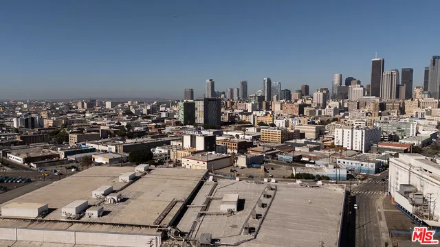 a view of a street with sitting area