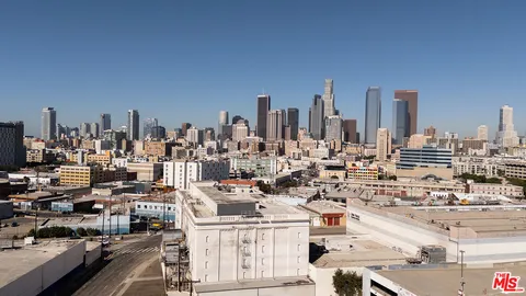 a view of a building with sitting area