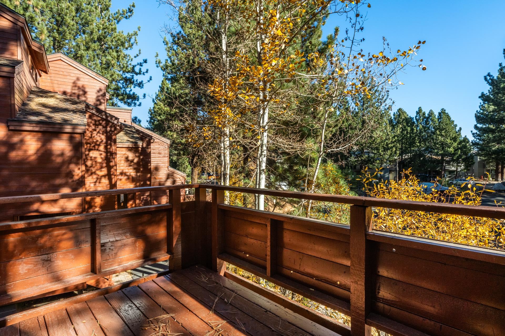 2112 Meridian Boulevard, Unit 7 Mammoth Lakes, CA 93546 - Photo 25 of 33 Wooden deck featuring view of scattered trees
