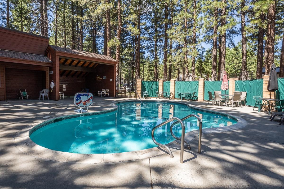 2112 Meridian Boulevard, Unit 7 Mammoth Lakes, CA 93546 - Photo 29 of 33 Community pool with a patio