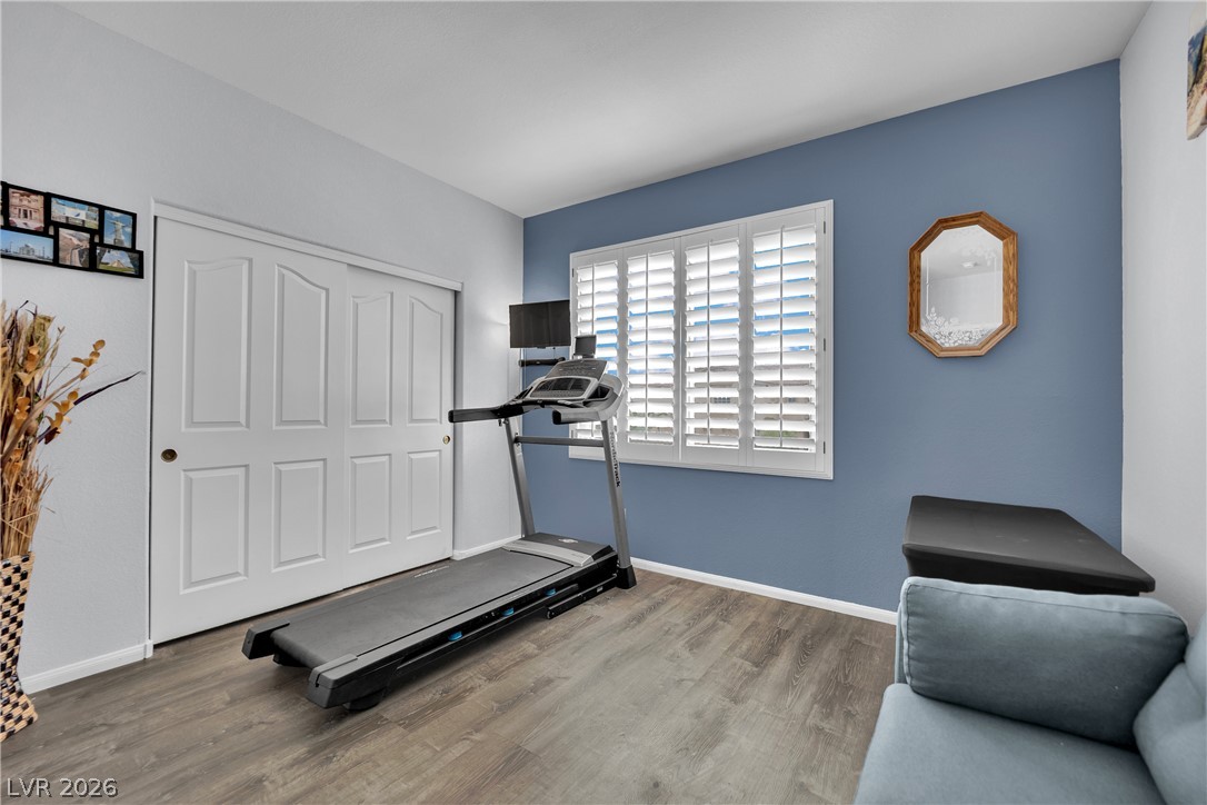 1724 Millstream Way Henderson, NV 89074 - Photo 31 of 60 Functional home gym offering a private workout space, complete with durable flooring and natural illumination.