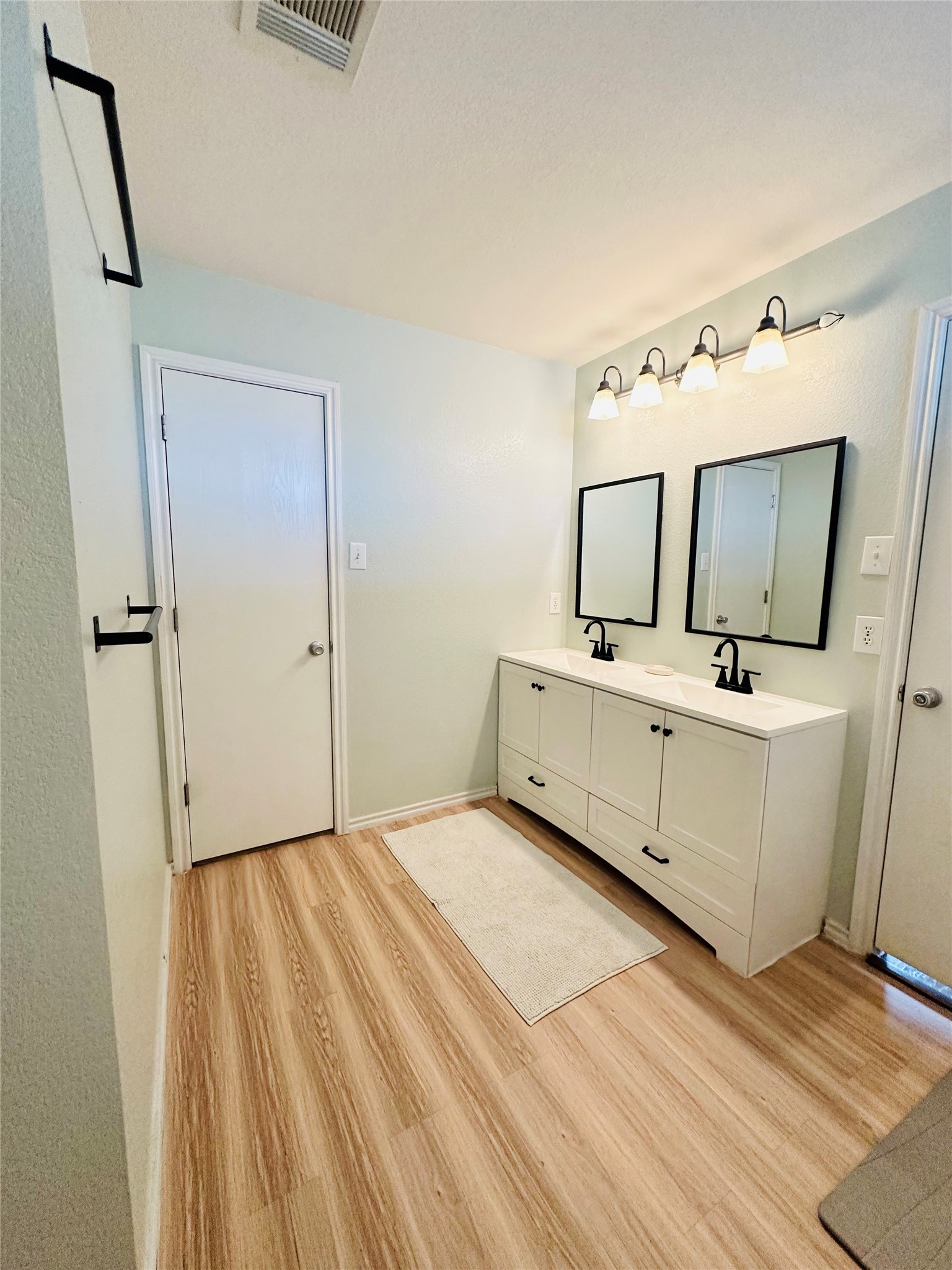 602 Lavaca Loop Elgin, TX 78621 - Photo 13 of 28 a bathroom with a sink mirror and toilet