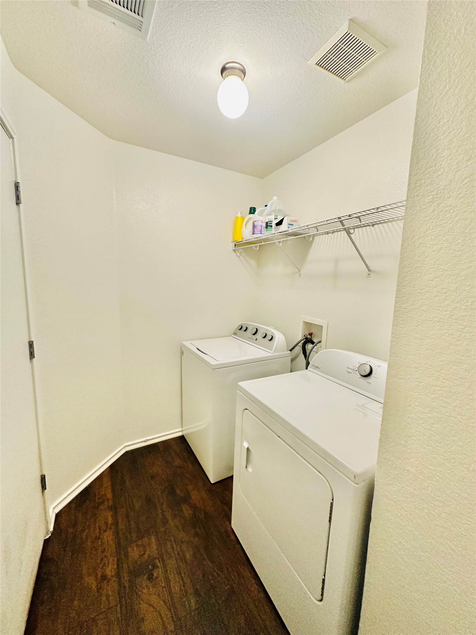 602 Lavaca Loop Elgin, TX 78621 - Photo 19 of 28 a utility room with dryer and washer