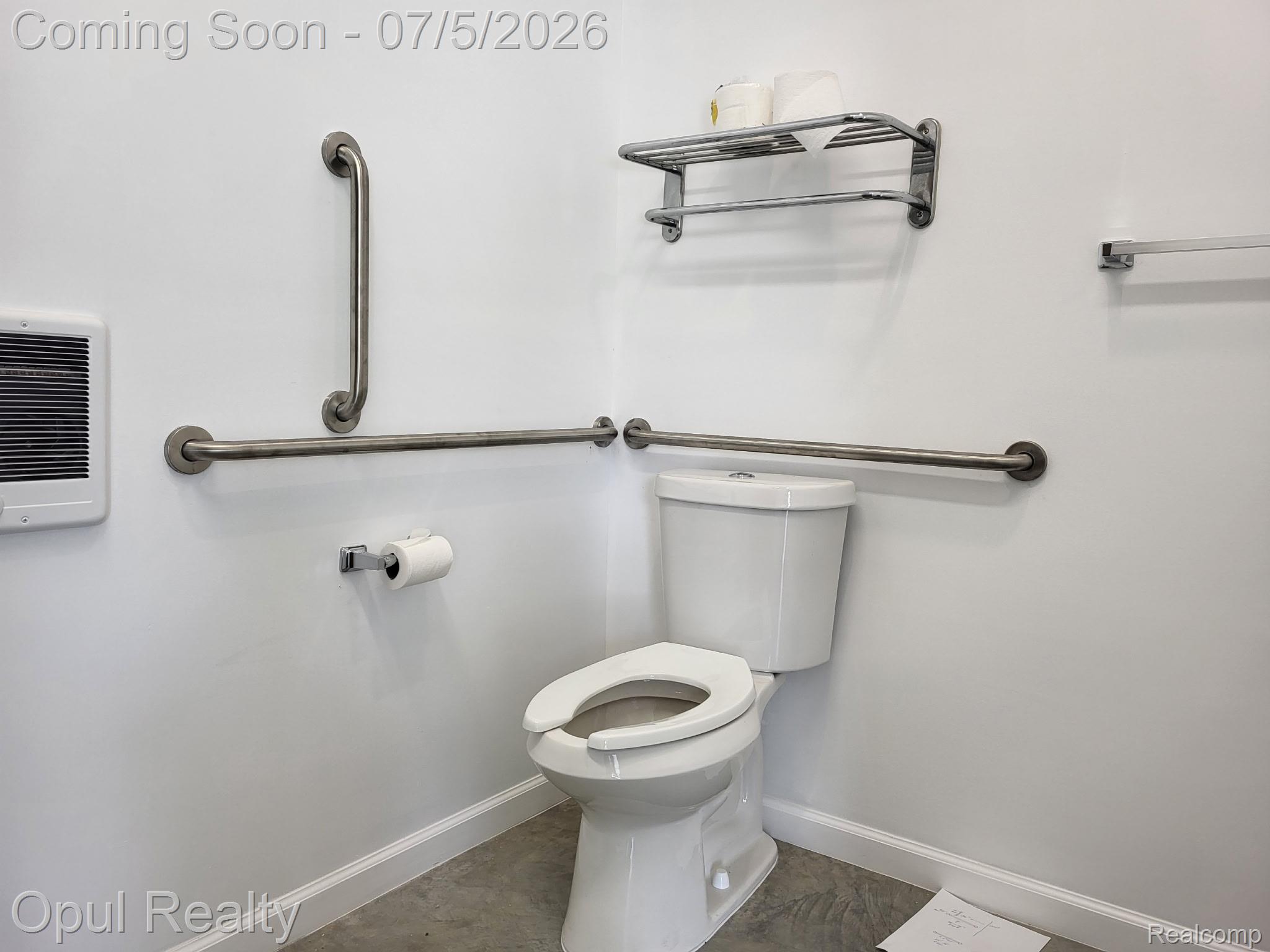 7503 Reading Road East Pittsford, MI 49271 - Photo 24 of 24 White toilet with an open seat