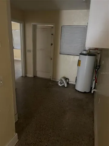 an empty room with a door