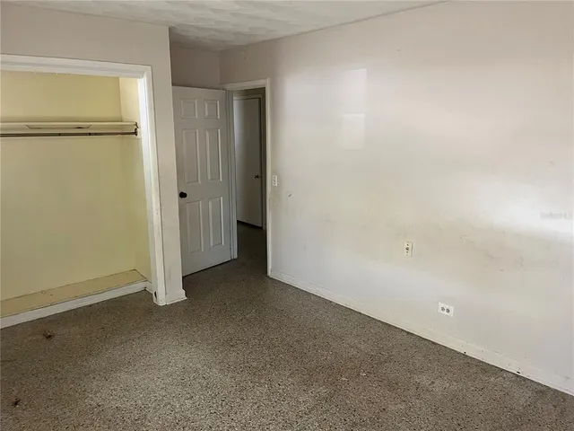 a bathroom with a toilet and a sink