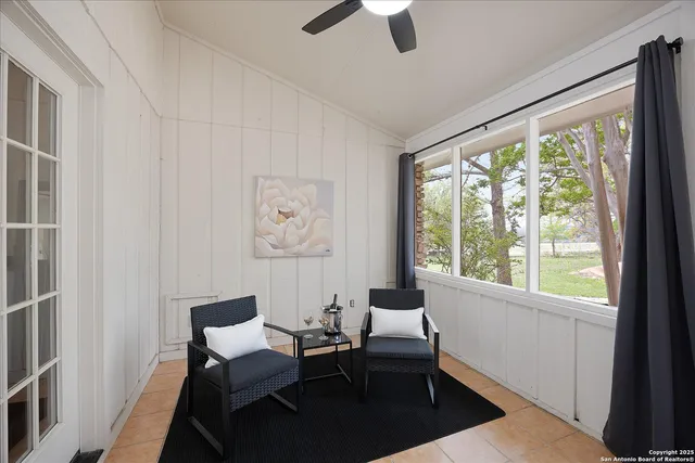 a kitchen with stainless steel appliances granite countertop a sink counter space cabinets and a large window