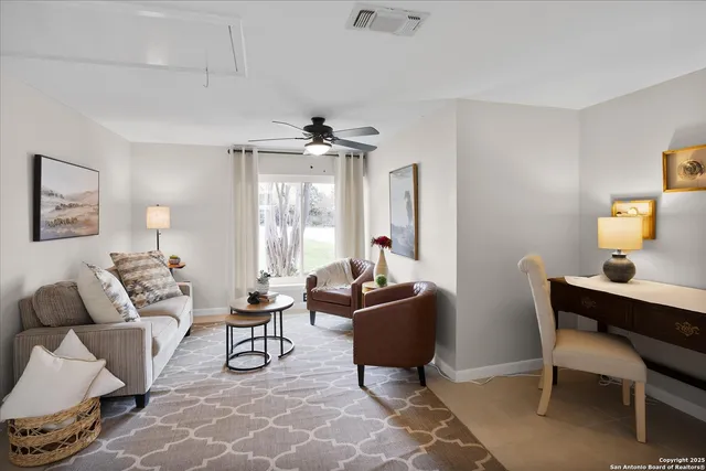 a view of a chairs and table on the patio