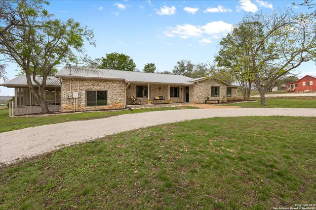 a view of residential houses with outdoor space