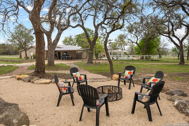 a view of a field with an outdoor space