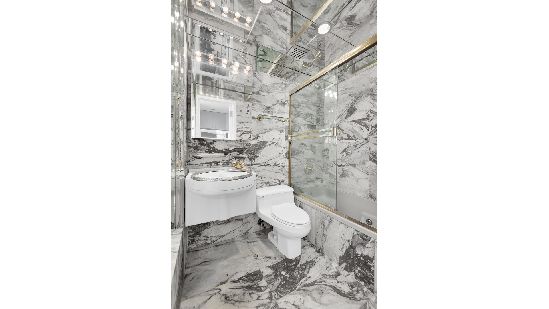 40 Sutton Place, Unit PHM Manhattan, NY 10022 - Photo 4 of 12 a bathroom with a toilet and sink