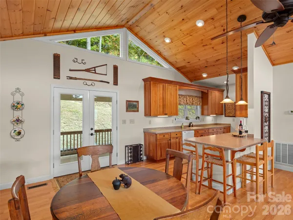 a dinning table and chairs in the kitchen