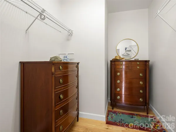 a view of a storage and utility room with closet