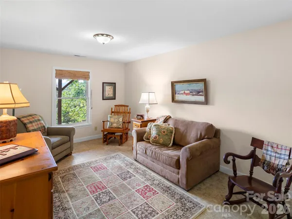 a living room with furniture and a couch