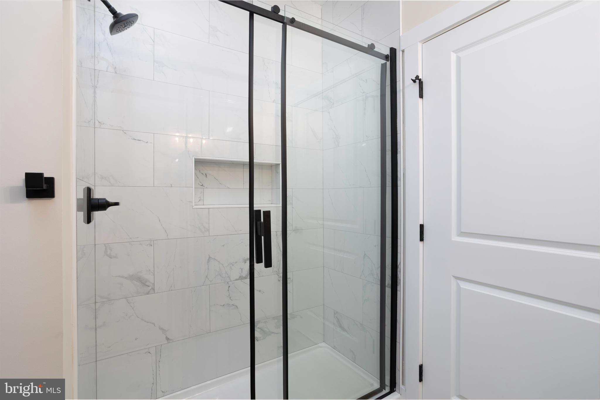 3 Sunrise Avenue Ridgely, MD 21660 - Photo 16 of 22 a bathroom with a glass shower door