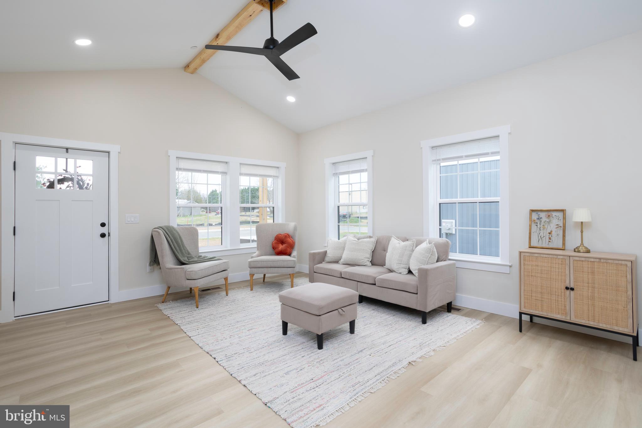 3 Sunrise Avenue Ridgely, MD 21660 - Photo 8 of 22 a living room with furniture and wooden floor