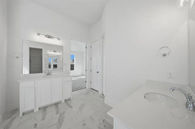 a view of empty room with windows