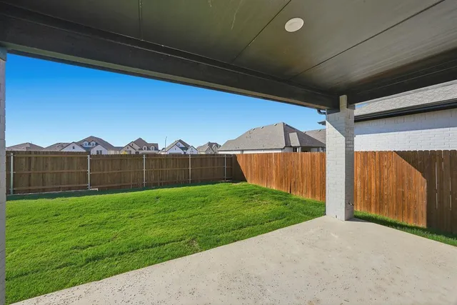 a view of a house with a big yard
