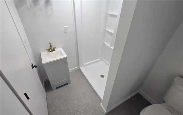 a bathroom with sink and mirror