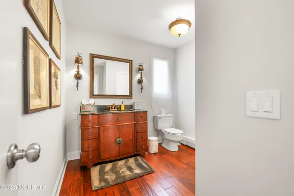 a bed room with a bed and a ceiling fan