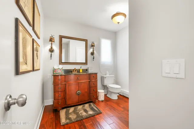 a bed room with a bed and a ceiling fan