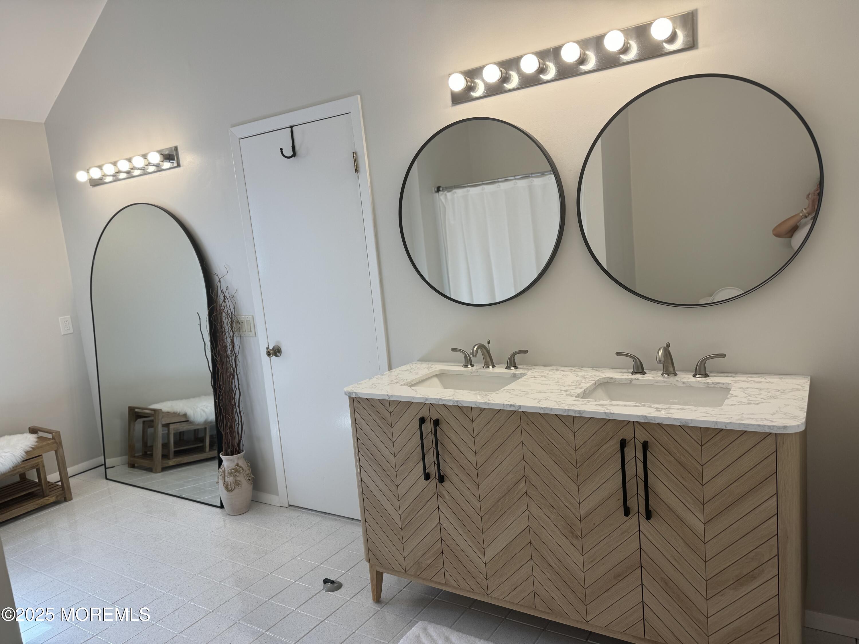 14 Toledo Drive Brick, NJ 08723 - Photo 36 of 75 a bathroom with a granite countertop sink a mirror and bathtub