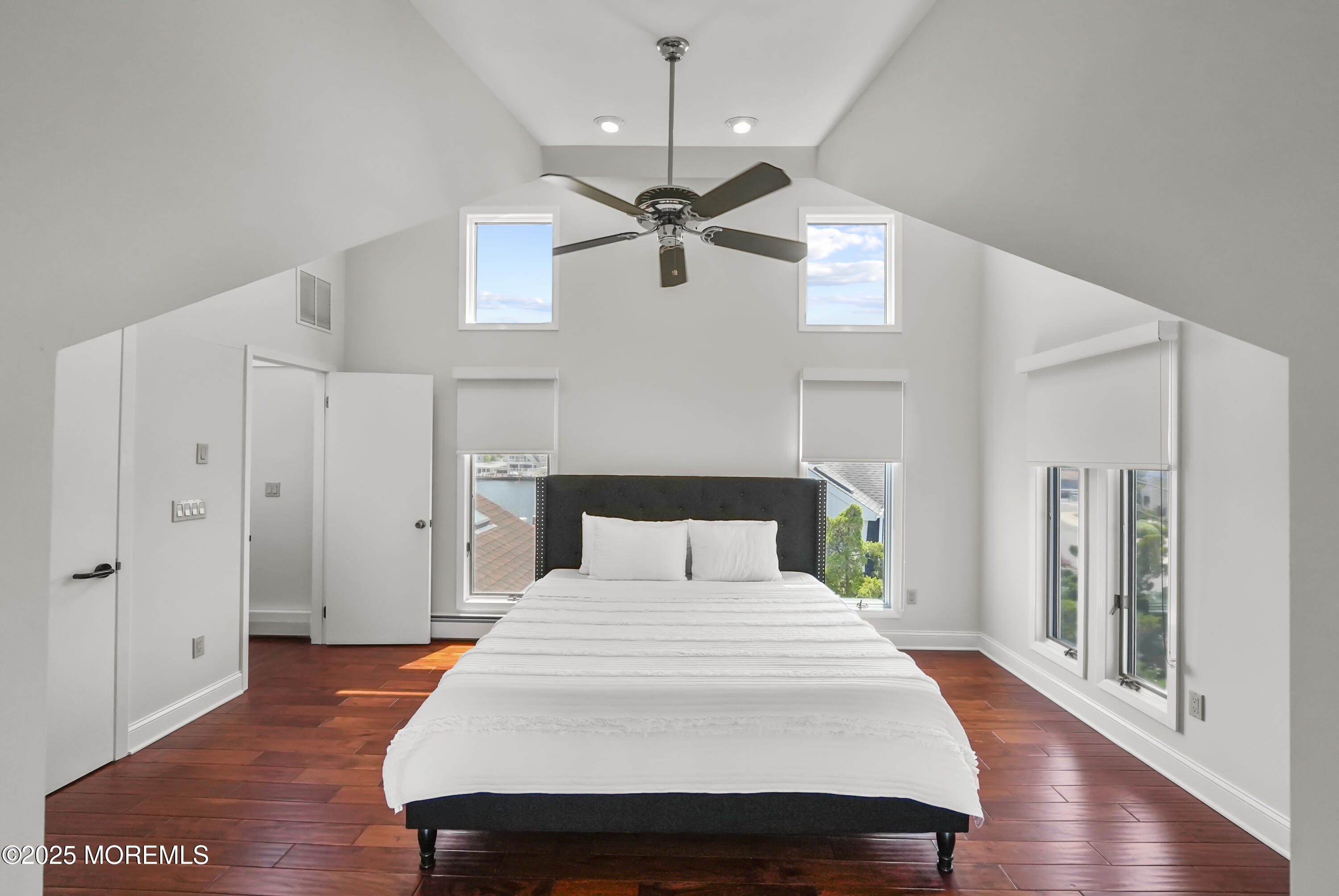 14 Toledo Drive Brick, NJ 08723 - Photo 47 of 75 a bedroom with a bed and a chandelier