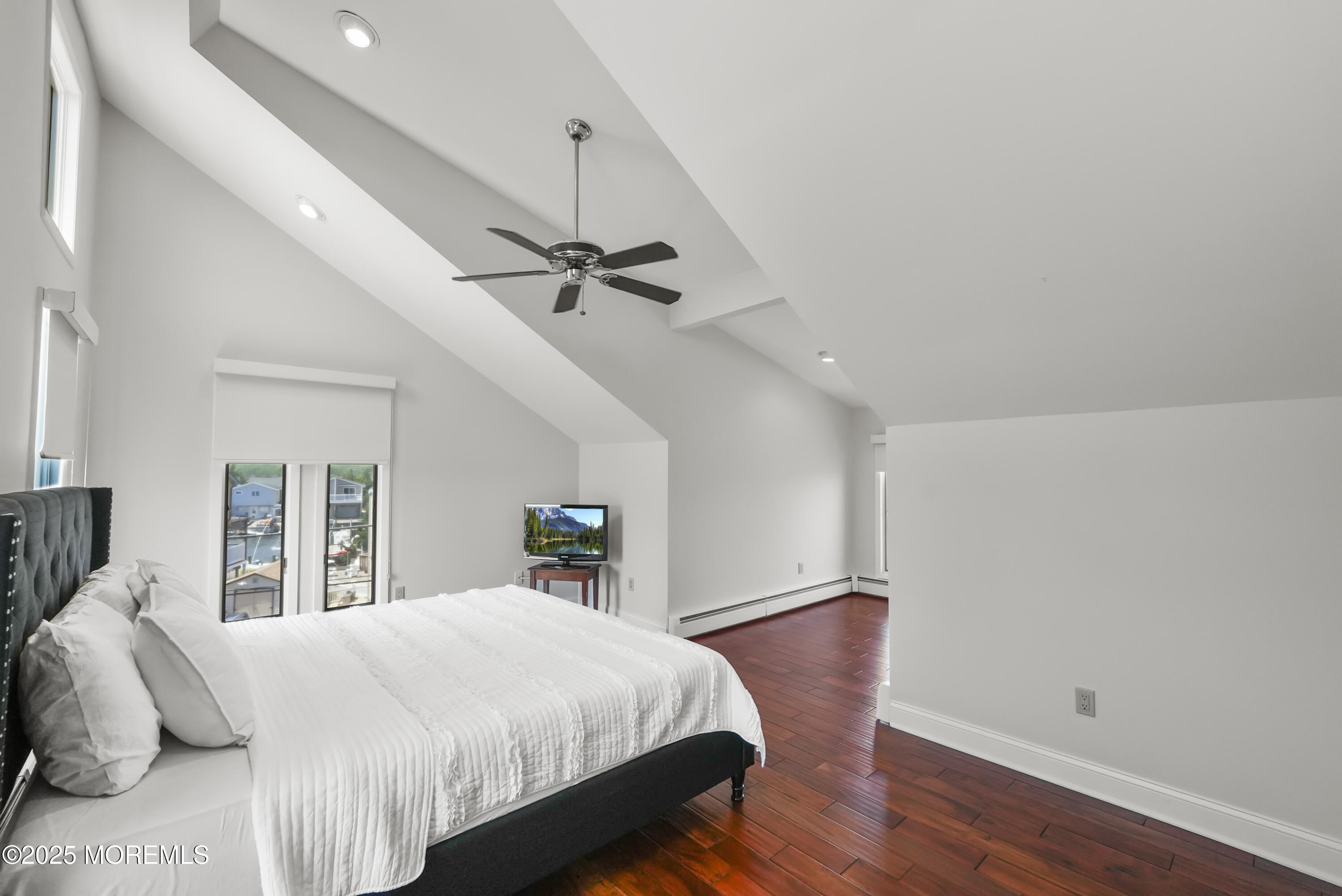 14 Toledo Drive Brick, NJ 08723 - Photo 48 of 75 a bed room with a bed and a ceiling fan