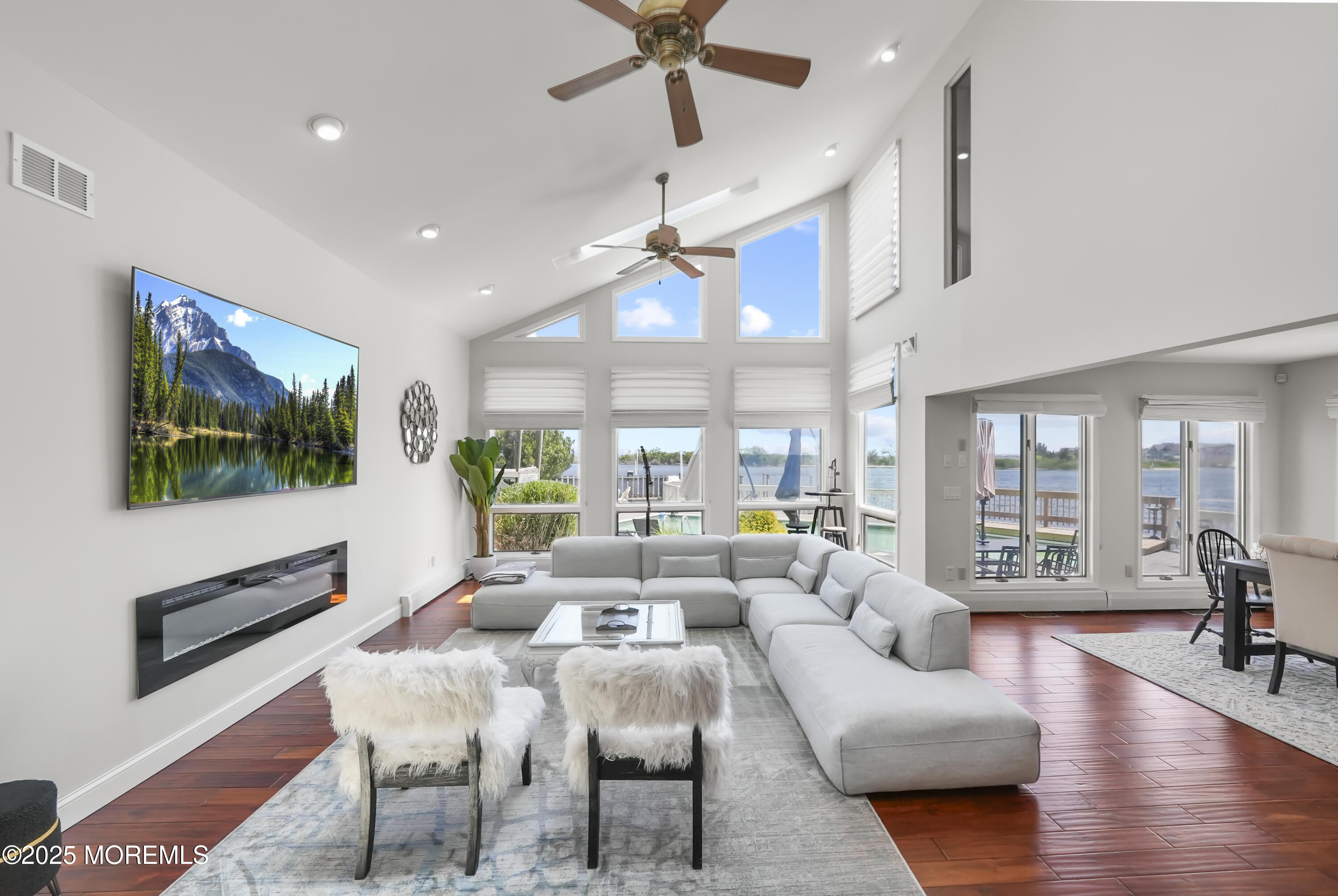14 Toledo Drive Brick, NJ 08723 - Photo 8 of 75 a living room with furniture a flat screen tv and a large window