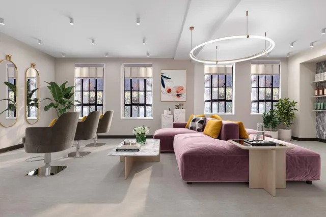 a living room with furniture potted plant and a window