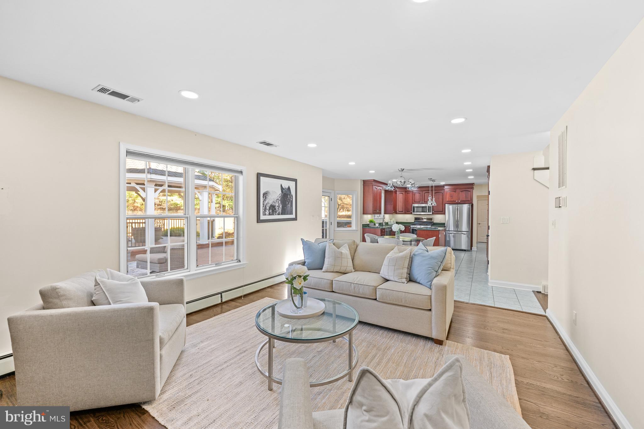 4807 Bready Road Rockville, MD 20853 - Photo 12 of 44 a living room with furniture and a large window