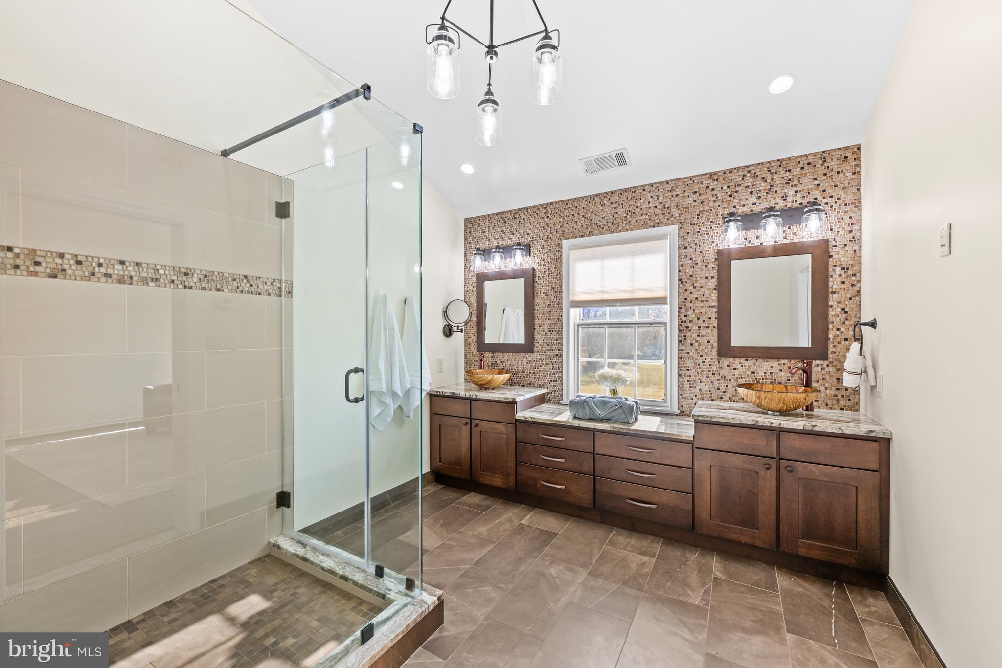 4807 Bready Road Rockville, MD 20853 - Photo 28 of 44 a large bathroom with a large tub and sink