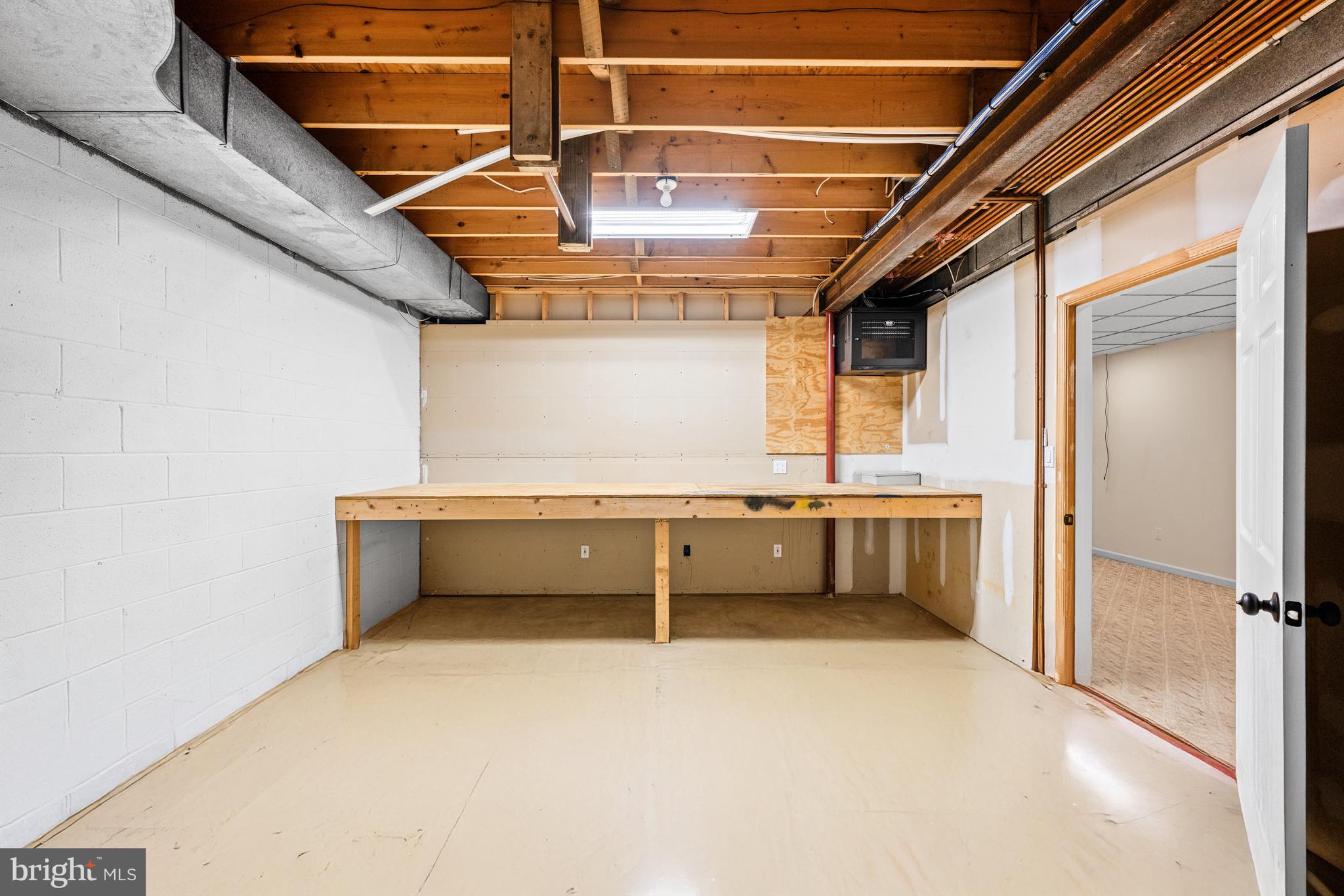 4807 Bready Road Rockville, MD 20853 - Photo 38 of 44 a view of an empty room with a window