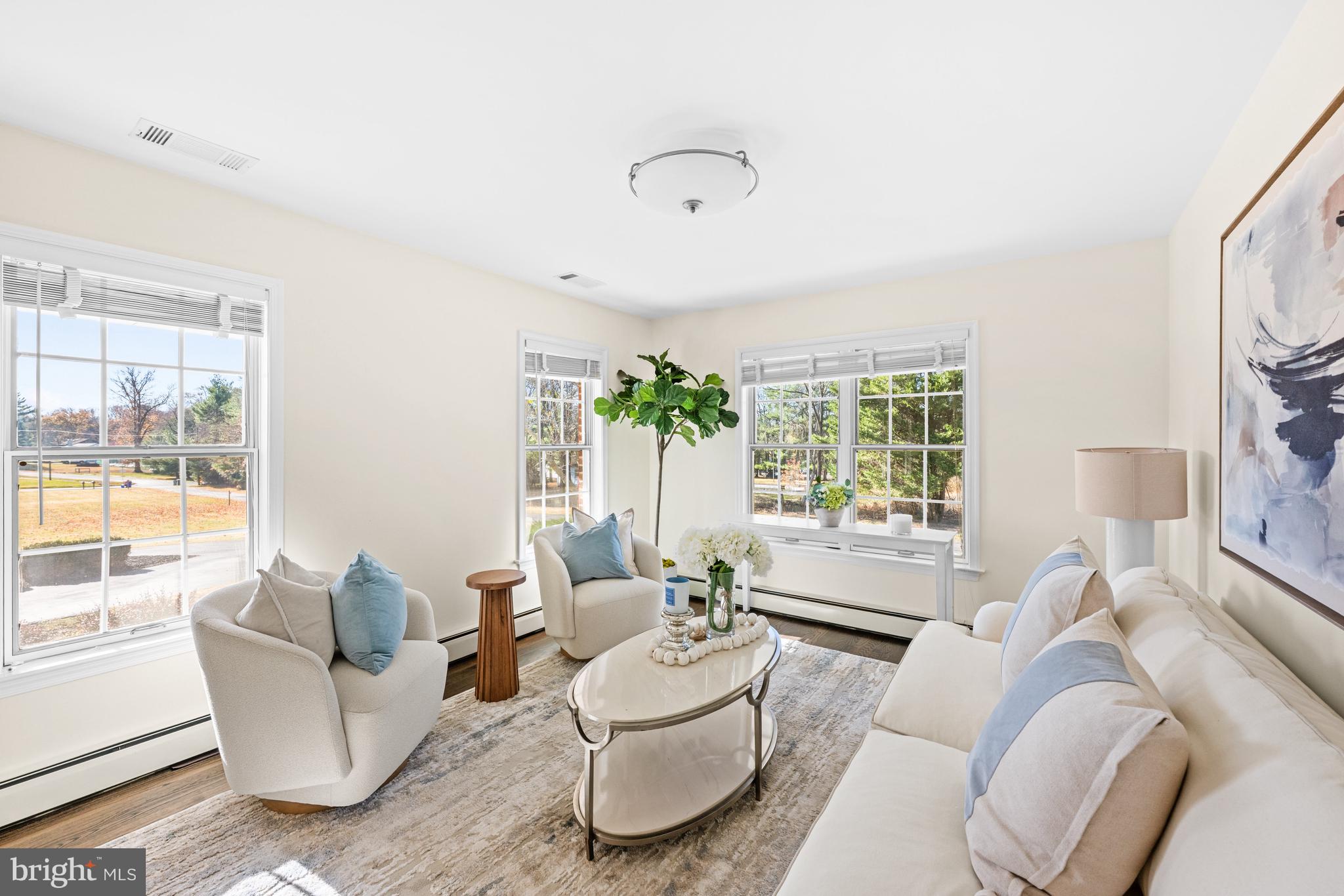 4807 Bready Road Rockville, MD 20853 - Photo 8 of 44 a living room with furniture and a large window